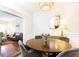 Bright dining room with round table, four chairs, and hardwood floors at 1230 Piedmont Ne Ave # 206, Atlanta, GA 30309