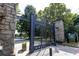 Entrance to Piedmont Park with ornate gates and stone pillars at 1230 Piedmont Ne Ave # 206, Atlanta, GA 30309