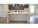 Large kitchen island with white countertop and gray cabinets at 756 Vireo Walk, Loganville, GA 30052