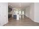 Open concept kitchen features island and gray cabinets at 756 Vireo Walk, Loganville, GA 30052