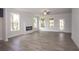 Spacious living room with fireplace and plenty of natural light at 756 Vireo Walk, Loganville, GA 30052