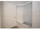 Built-in bench with storage and coat hooks in mudroom at 756 Vireo Walk, Loganville, GA 30052