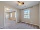 Bright bedroom with neutral decor and large window at 265 Windmill Pointe, Lawrenceville, GA 30044