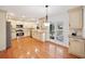 Eat-in kitchen with stainless steel appliances and light cream cabinets at 1237 Wynford Colony Sw, Marietta, GA 30064