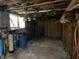 Unfinished basement with water filtration system and storage at 3955 Demooney Rd, Atlanta, GA 30349