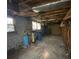 Unfinished basement with water filtration system and storage at 3955 Demooney Rd, Atlanta, GA 30349