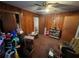 Bedroom with wood paneling, ceiling fan, and ample closet space at 2219 Wingate Sw St, Atlanta, GA 30310