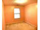 Small bedroom with carpeted floor and window coverings at 5625 Terremont Cir, Norcross, GA 30093