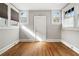 Well-lit bedroom featuring hardwood floors and ample window light at 1524 S Gordon Sw St, Atlanta, GA 30310