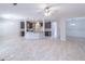 Open concept kitchen and dining area with granite countertops and stainless steel appliances at 2162 Reddy Farm Lane, Grayson, GA 30017