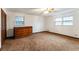 Bright bedroom with neutral walls and carpet at 240 Thornton Dr, Fayetteville, GA 30214