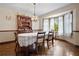 Bright dining room with hardwood floors and bay window at 4240 Stilesboro Nw Rd, Kennesaw, GA 30152