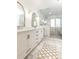 Elegant bathroom with marble tile, soaking tub, and walk-in shower at 944 Northern Se Ave, Atlanta, GA 30316