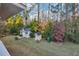 Spacious backyard with storage sheds and lush landscaping at 6495 Bennington Dr, Tucker, GA 30084