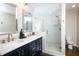 Elegant bathroom with double vanity and glass shower at 1628 Ezra Church Nw Dr, Atlanta, GA 30314