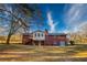 Back of house showing sunroom and yard at 176 Teresa Ln, Loganville, GA 30052