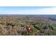 Wide aerial view showcasing the property and surrounding landscape at 157 Reynolds Rd, Bowdon, GA 30108