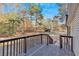 Wooden deck overlooking backyard and wooded area at 157 Reynolds Rd, Bowdon, GA 30108