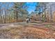 Rustic detached shed in a wooded area at 157 Reynolds Rd, Bowdon, GA 30108
