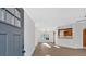 Bright entryway with view into living area and kitchen at 157 Reynolds Rd, Bowdon, GA 30108