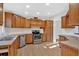 Open kitchen with ample cabinetry and stainless steel appliances at 157 Reynolds Rd, Bowdon, GA 30108