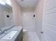 Bathroom with granite countertop and white subway tile at 2005 Ocean Nw Dr, Atlanta, GA 30318