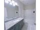 Clean bathroom with granite countertop and shower/tub combo at 2005 Ocean Nw Dr, Atlanta, GA 30318