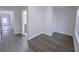Simple bedroom with wood floors and access to a bathroom at 2005 Ocean Nw Dr, Atlanta, GA 30318