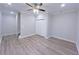 Spacious bedroom with dark wood-look floors and closet at 2005 Ocean Nw Dr, Atlanta, GA 30318