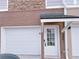 Attached garage with private entrance and brick facade at 2005 Ocean Nw Dr, Atlanta, GA 30318