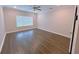 Spacious living room with hardwood floors and ceiling fan at 2005 Ocean Nw Dr, Atlanta, GA 30318