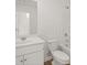 Clean bathroom with white vanity, toilet and bathtub at 2058 Pecan Dr, Douglasville, GA 30135