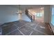 Open dining room with a view of the staircase and Gathering room at 616 Gilles Ln, Cumming, GA 30041