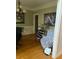 Bright dining area with hardwood floors and chair at 8228 River Pointe Overlook, Winston, GA 30187