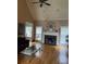 Spacious living room with hardwood floors and fireplace at 8228 River Pointe Overlook, Winston, GA 30187
