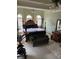 Large main bedroom with a king-size bed and sitting area at 8228 River Pointe Overlook, Winston, GA 30187