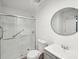 Updated bathroom with a walk-in shower and vanity at 703 Pine Tree Trl, Atlanta, GA 30349