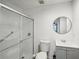 Clean bathroom with a walk-in shower and modern vanity at 703 Pine Tree Trl, Atlanta, GA 30349