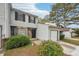 Townhome exterior with stone accents and landscaping at 703 Pine Tree Trl, Atlanta, GA 30349