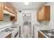 Bright kitchen with view into adjacent living area at 703 Pine Tree Trl, Atlanta, GA 30349