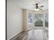 Living room featuring bay windows and ceiling fan at 703 Pine Tree Trl, Atlanta, GA 30349