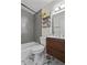 Bathroom with gray subway tiles, a floating vanity, and marble floor at 3230 Santa Fe Sw Trl, Marietta, GA 30060