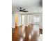 Open living room with hardwood floors and high ceilings at 540 Langley Creek Dr, Loganville, GA 30052