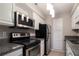 Updated kitchen, featuring stainless steel appliances at 2101 Pine Heights Ne Dr, Atlanta, GA 30324