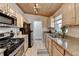 Updated kitchen featuring stainless steel appliances and wood cabinets at 3649 Vanet Rd, Chamblee, GA 30341