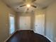 Bedroom with double doors to closet and access to a patio at 3230 Mill Springs Cir, Buford, GA 30519