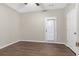 Bright bedroom with hardwood floors and backyard access at 3230 Mill Springs Cir, Buford, GA 30519