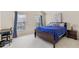 Spacious bedroom with a king-size bed, large windows and a work area at 617 Ocean Ave, Canton, GA 30114