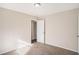 Well-lit bedroom with ample closet space and carpet at 245 Bromack Se Dr, Atlanta, GA 30315