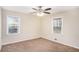 Well-lit bedroom with neutral carpeting and ample natural light at 245 Bromack Se Dr, Atlanta, GA 30315